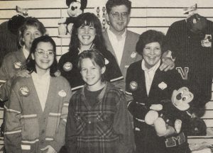 Jonathan Taylor Thomas with the manager and workers at the Disney souvenier store in Cleveland, Ohio.