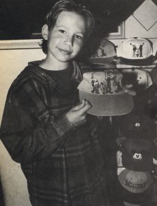 Jonathan Taylor Thomas with a fishing cap visiting the Disney souvenir store in Cleveland, Ohio.